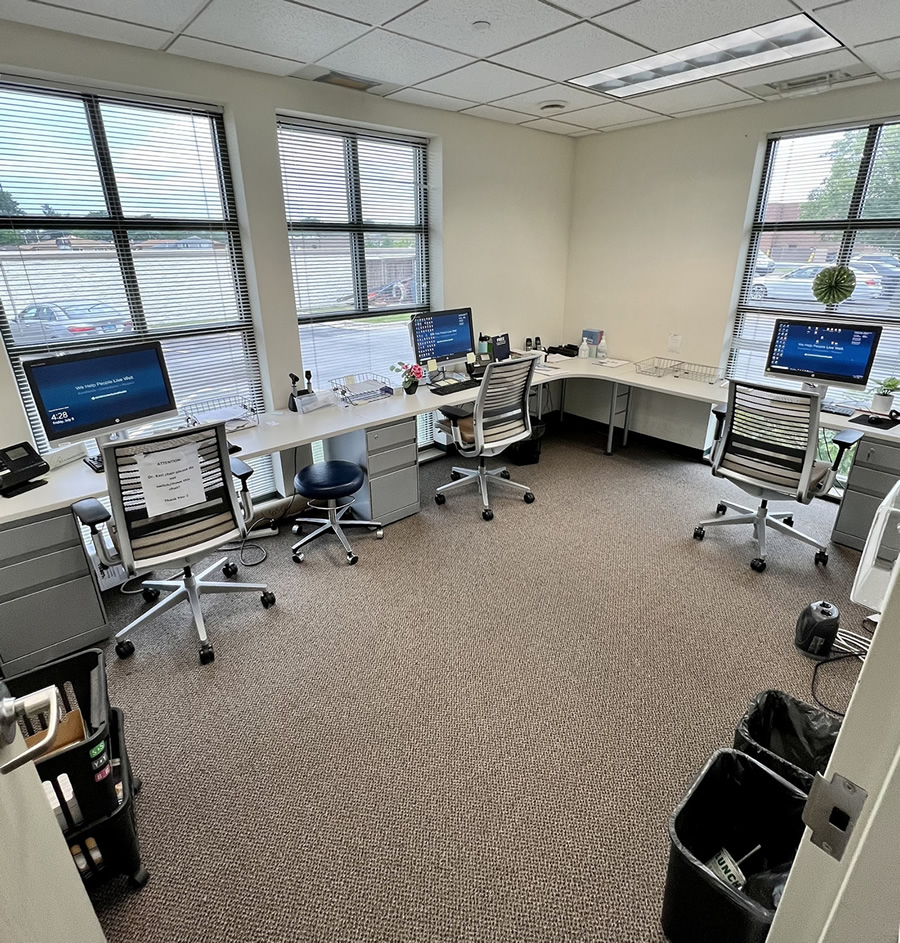 Office space with computers and chairs