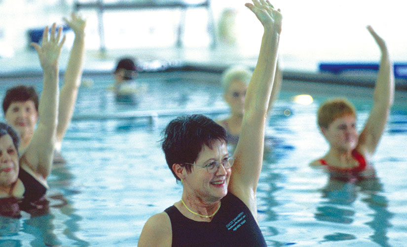 Women attending swim exercise class
