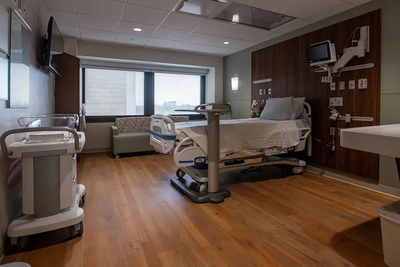 Couch and rocking chair in private rooms at the birthing center at Good Samaritan Hospital. 