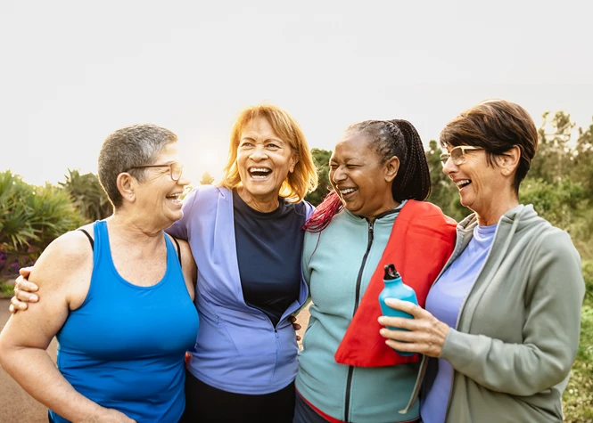 Four women talk and share ideas.