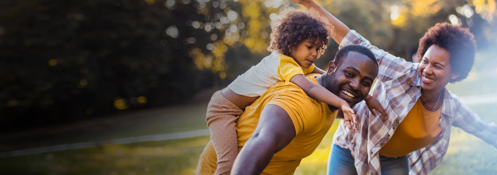 A family plays outside